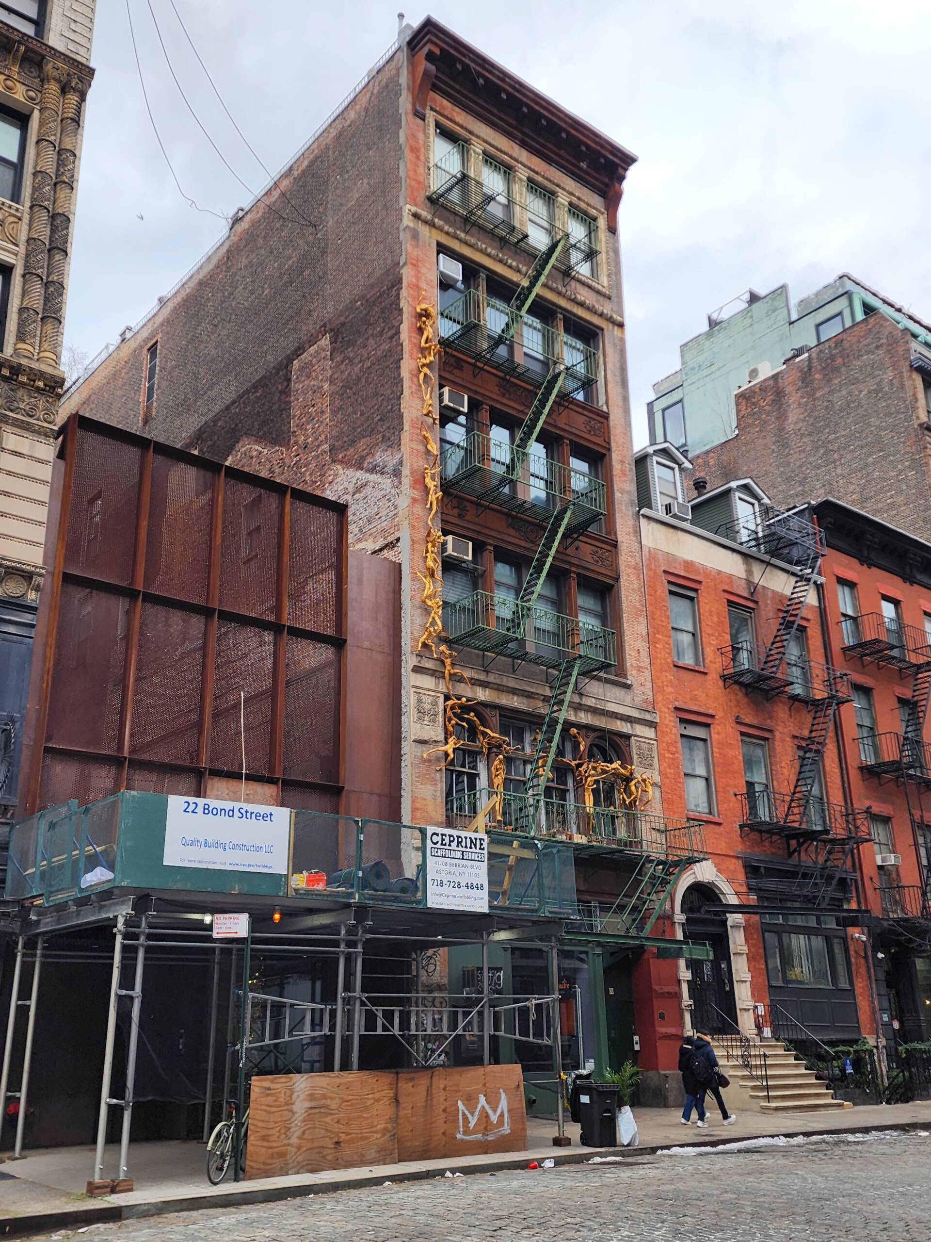A sidewalk shed on a NoHo block in Manhattan