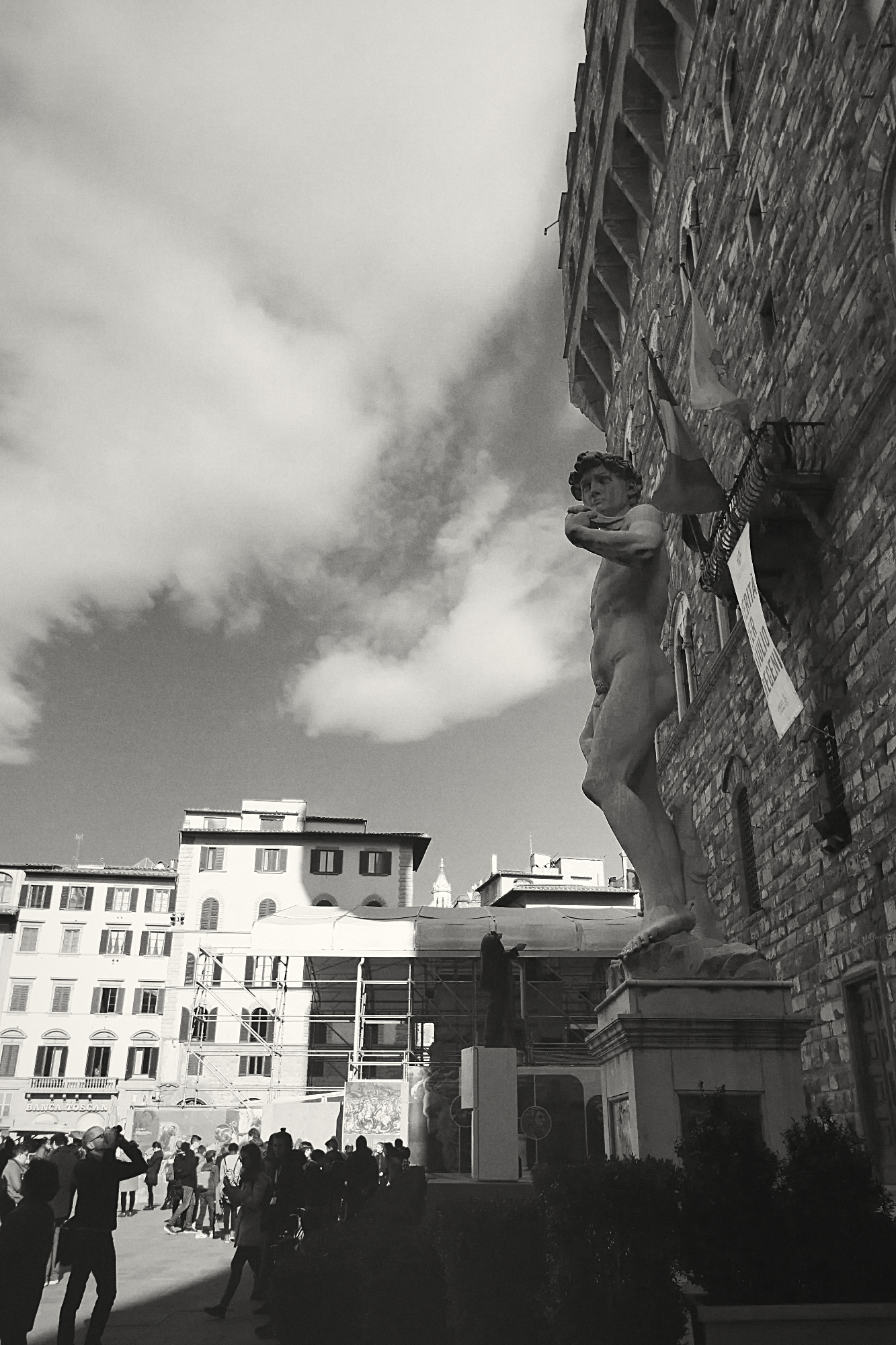 David seen from below outside Palazzo Vecchio, Piazza della Signoria, Florence