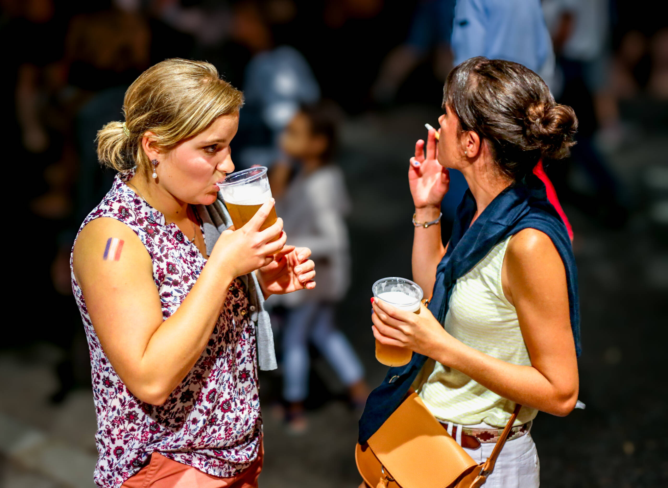 Sharing a Beer at a European Festiva