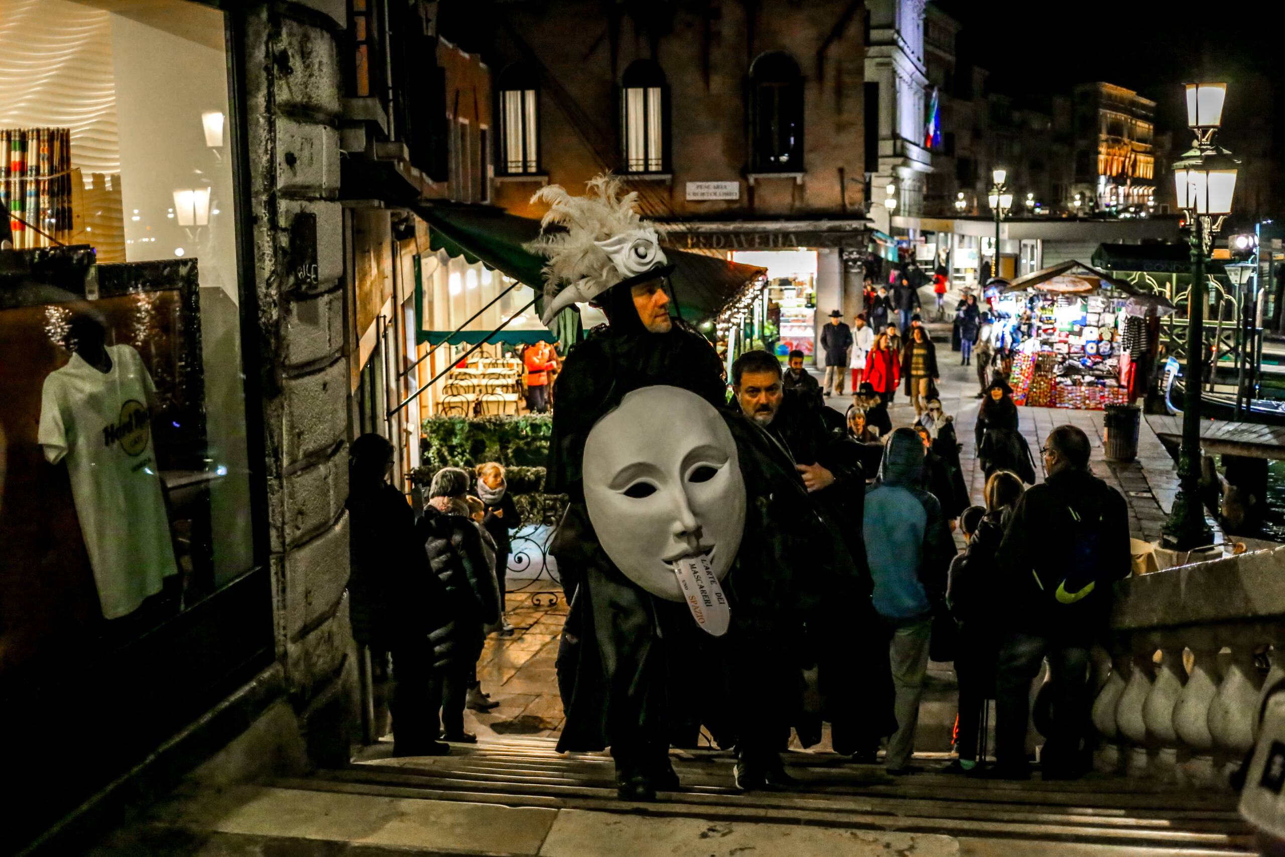 Mask Seller in Plumed Tricorn on the Rialto Steps, Venice at Night
